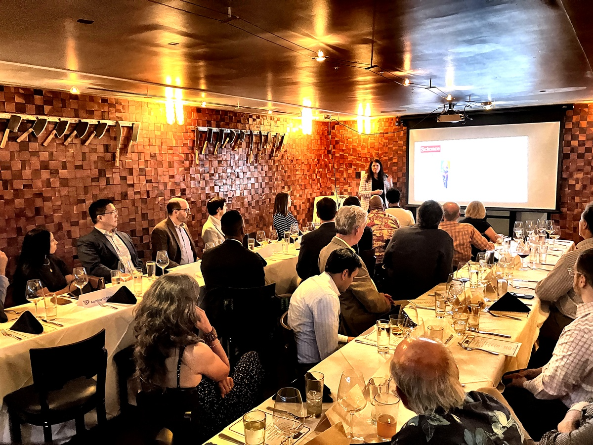 Dr. Kimberley Lakes presenting at the PowerUP Supporters Dinner, June 2026